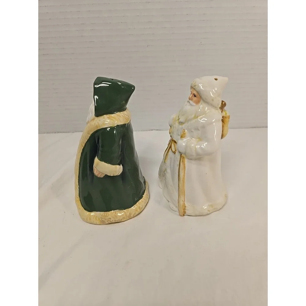 Santa Claus Through‎ The Years Salt & Pepper Shakers 5 Inches